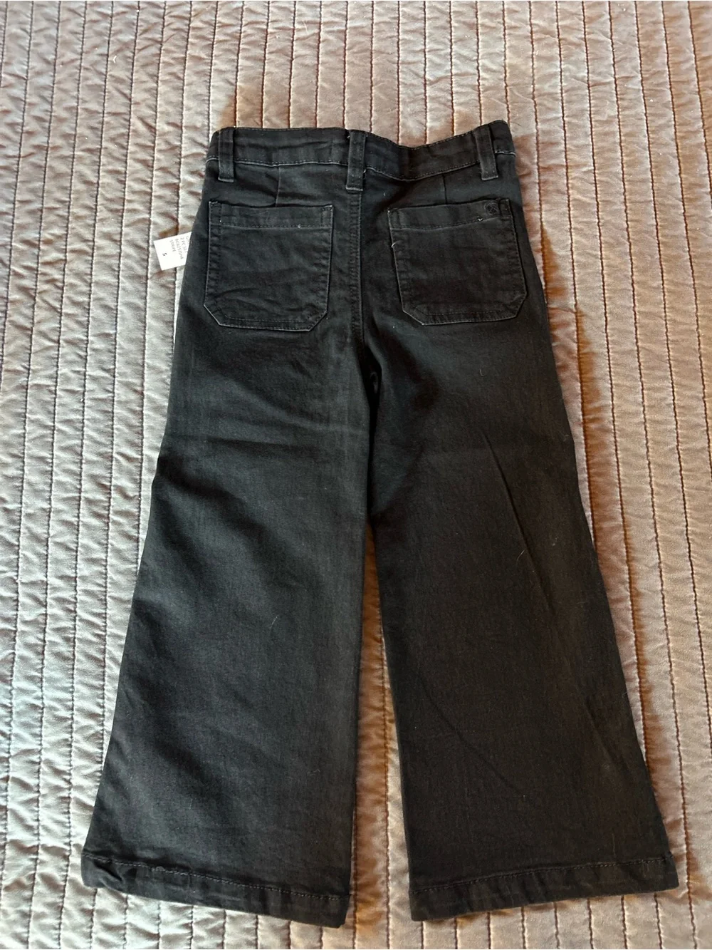 Jessica Simpson Black & Cream Striped Knit Top & black jeans